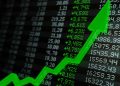 $10,000 5 Years Ago Bought 63 Macquarie Shares – How Many Now?